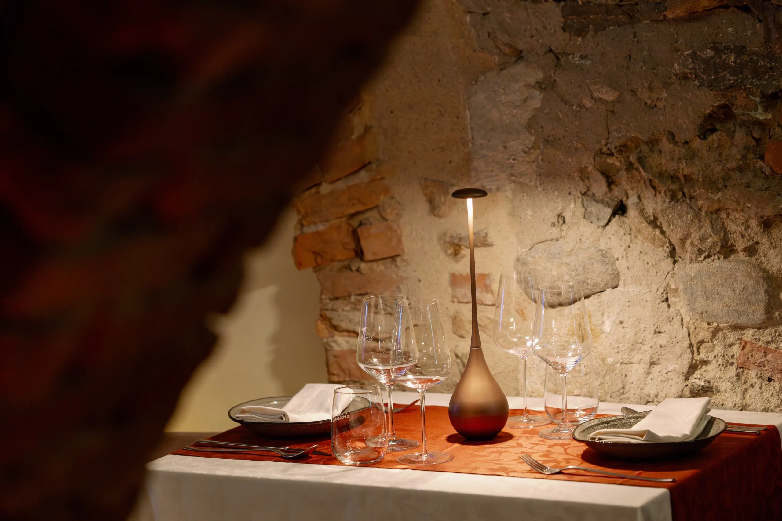 Candlelit table setting in Tabla’s dining room